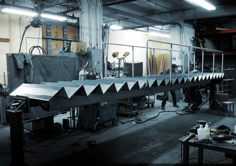 Stringer stair being fabricated in Caliper's shop